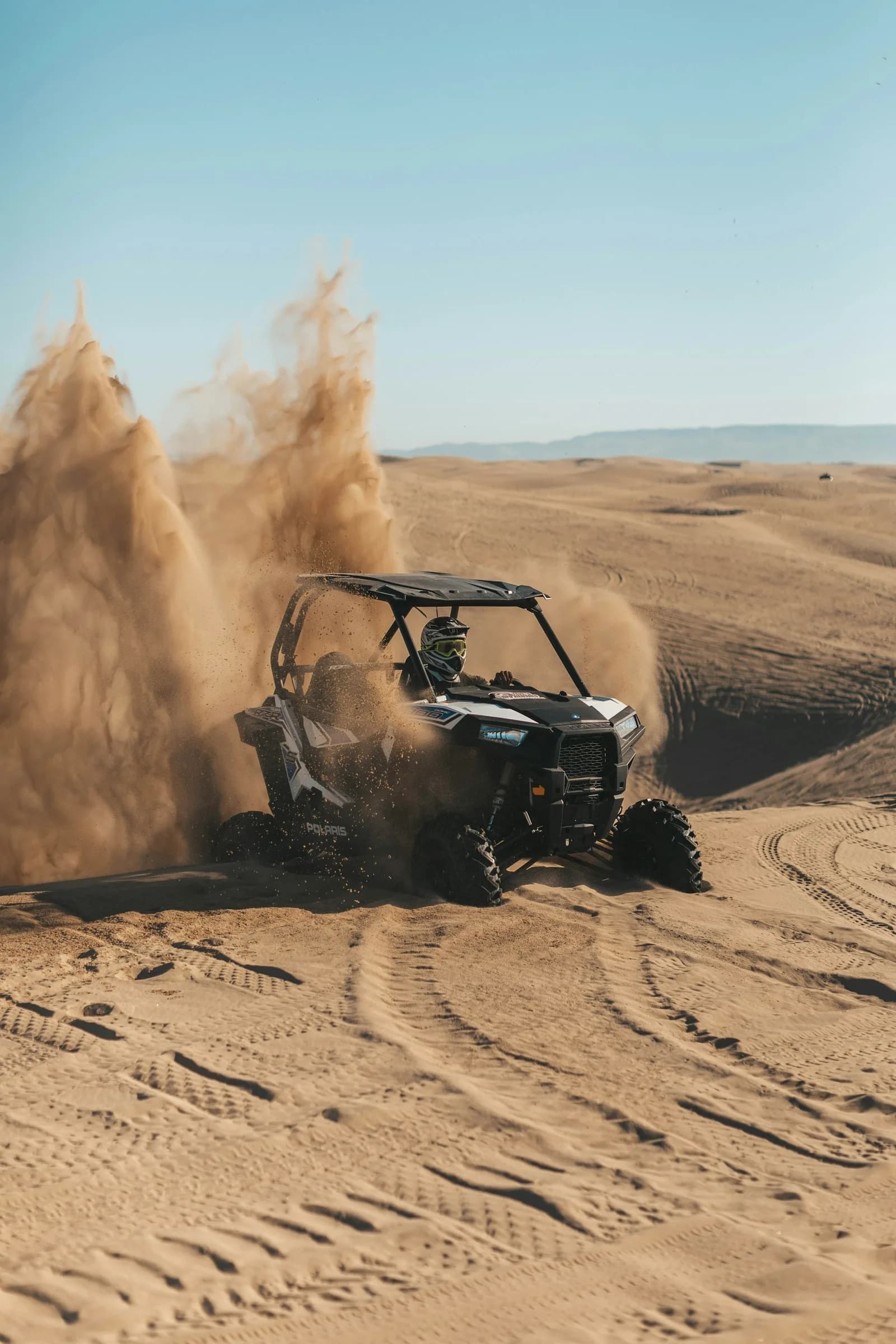 Kids dune buggy ride on a safe sandy track in the Dubai desert — photo 1