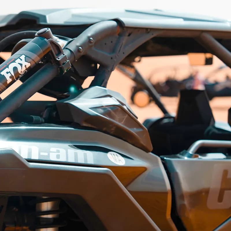 Can-Am X3 Turbo 4-seat dune buggy on the red dunes of the Dubai desert — photo 2