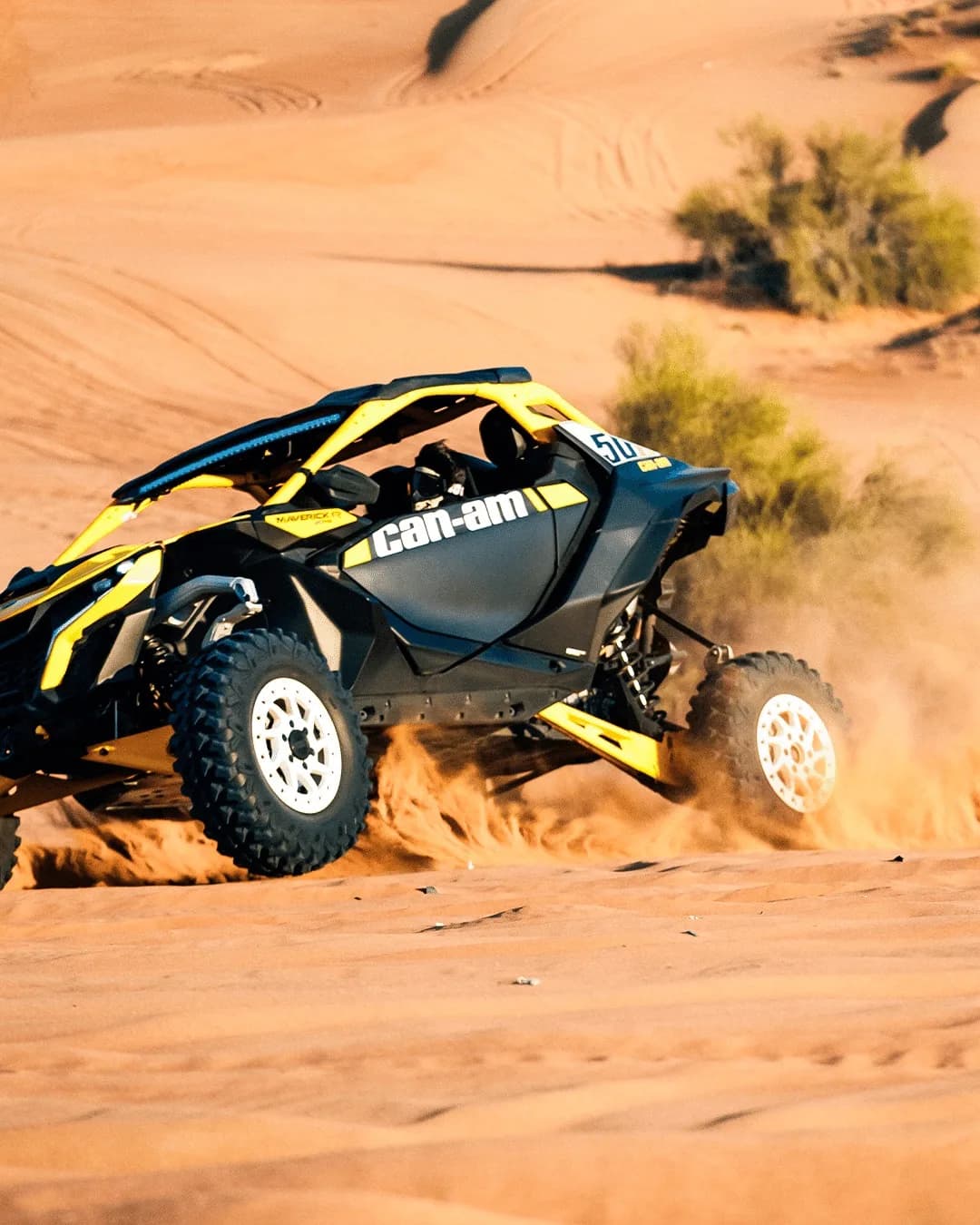 Can-Am Maverick R drifting in the Dubai desert sand